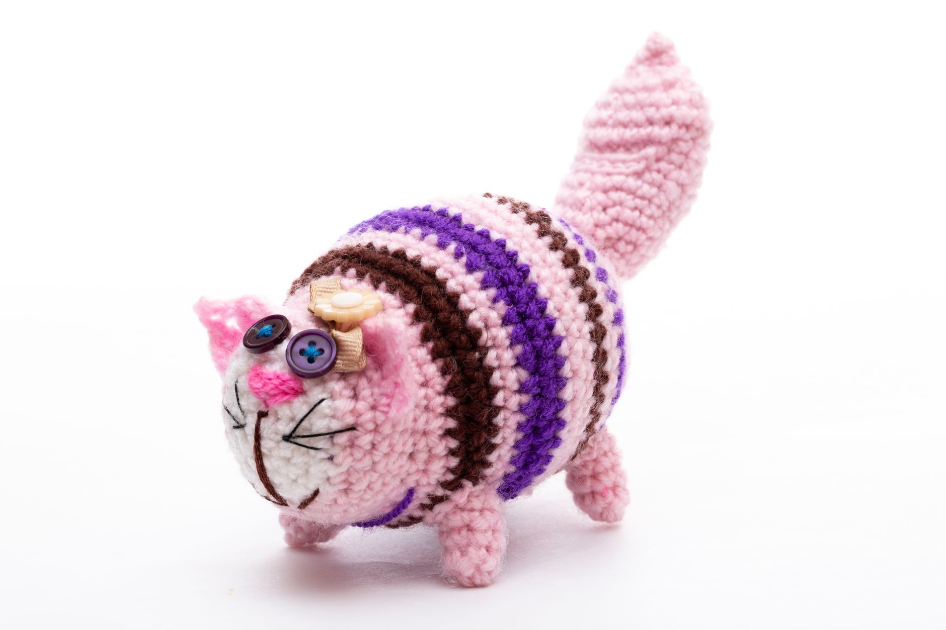 Kawaii-style pink electronic toy design, similar to the Otamatone Kirby edition